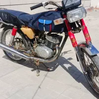 موتورسیکلت سوزوکی 100مدل 80دوبرگ سندسفید