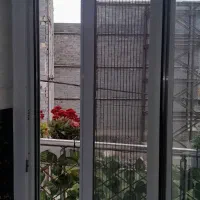 ساخت وتعمیرونصب پنجره توری کشویی