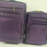 چمدان‌درجه‌یک‌مسافرتی چهار‌چرخ در حد نو