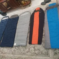 تعدادی کیسه خواب کوهنوردی اورجینال زیرانداز پتو