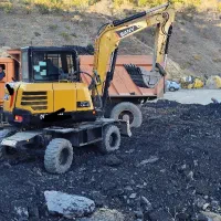 بیل  مینی بیل لاستیکی سانی