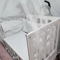 گهواره کنار مادر