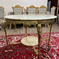 میز برنز و صندلی گهواره ای