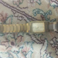 کتاب قران قدیمی وساعت قدیمی|کلکسیون اشیاء عتیقه|الیگودرز, |دیوار