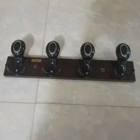 آویز لباس چوب لباسی