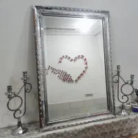 آینه شمعدان و ساعت