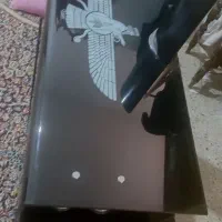 زیر تلویزیونی شیشه ای