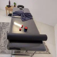 تخت و روغن ماساژ