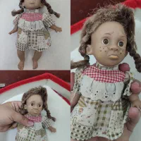 عروسک قدیمی زشت