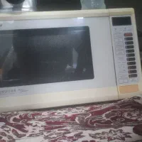 مایکروفر پاناسونیک لمسی لا کاغذی در حد نو
