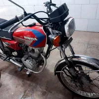 هوندا 125 سوزوکی ax100
