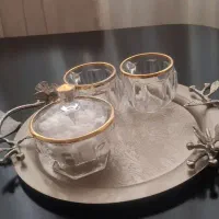 ۱۲ عدد چایی خوری لب طلایی  و ۴ تا قندون لب طلایی