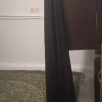تعدادی کفش و صندل وچادر عربی
