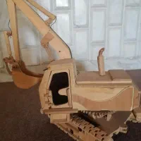 کشتی وماشین خاکبرداری دست ساز.