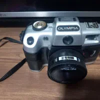 دوربین المپیا|دوربین عکاسی و فیلم‌برداری|پیر بکران, |دیوار