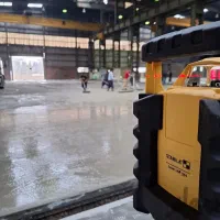 بتن ریزی با ماله پروانه و تراز لیزری