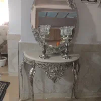 آینه و شمعدان تازه خریداری شده در حد نو