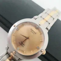 ساعت مجلسی ژاپنی اوماکس OMAX نو طلایی بند استیل