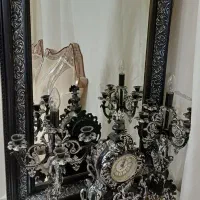 اینه و شمعدان به همراه ساعت