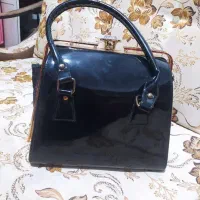 کیف و کفش مجلسی|کیف، کفش، کمربند|کاشان, کوشک صفی|دیوار