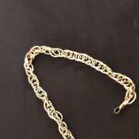 گردنبند 16 گرم .دستبند 4گرم و گل گوش 2گرم