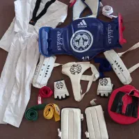 لباس ورزش تکواندوتجهیزات ایمنی مارک آدیداس و استخر