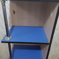 قفسه کتاب و عروسک