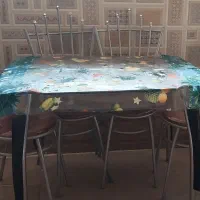 میز ناهارخوری شیشه‌ای