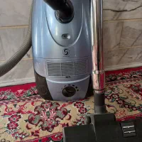 میز ناهارخوری و کالسکه  وجارو برقی