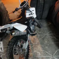 تریل بهرو|موتورسیکلت|قائن, |دیوار