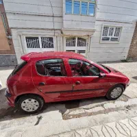 ۲۰۶ قرمز عروسک