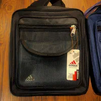 کیف دوشی آدیداس کپی درجه یک برزنتی مشکی و سرمه ای