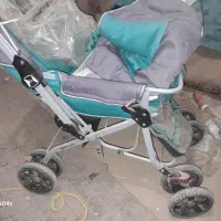 یک عدد دوچرخه ۲۰ و کالسکه