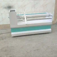 دستگاه برش رول پارچه و