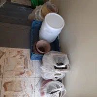کوزه  سفالی  وپلاستیکی