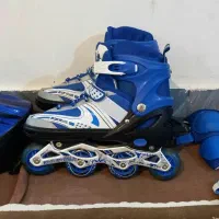 لباس کفش زانوبند وکلاه اسکیت ورزشی