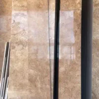 تهاتر سنگ ساختمانی تراواتن با ملک در تهران