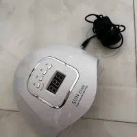 دستگاه uvهمراه تعدادی لاک ژل