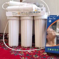 دستگاه تصفیه آب همراه دو بسته فیلتر