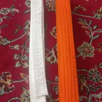 کمربند کاراته نارنجی و سفید