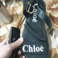 صندل|کیف، کفش، کمربند|قم, باغ شازده|دیوار