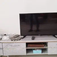 تلویزیون و میز زیر تلویزیون