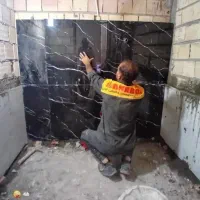 بازسازی تخریب کاشی وسرامیک کارکاشی کاری گچ کار سنگ