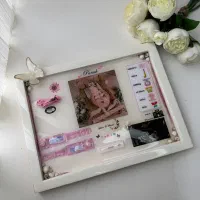 استند نوزادی و قاب یاد بود