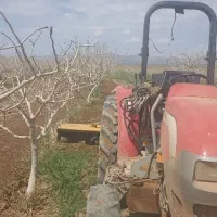 تراکتور کوچیک مخصوص باغ کودپاش ریختن پای درخت