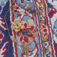 طلا تقریبا ۲۱گرم