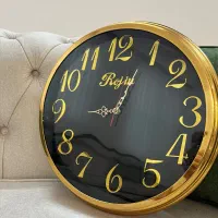 ساعت دیواری قاب فلزی آرام گرد