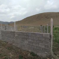 1. زمین باغی دیوارکشی و فنس‌کشی شده کنار جاده اصلی|فروش زمین و ملک کلنگی|دورود, |دیوار