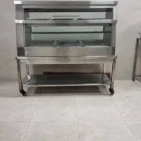 دستگاه دیسپلی با میز و پاتیل