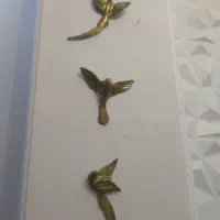 سه پرنده برنجی